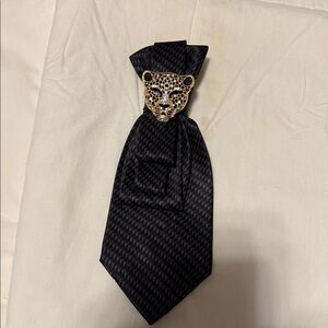 Elegant Black Tie with Gold Leopard Accent